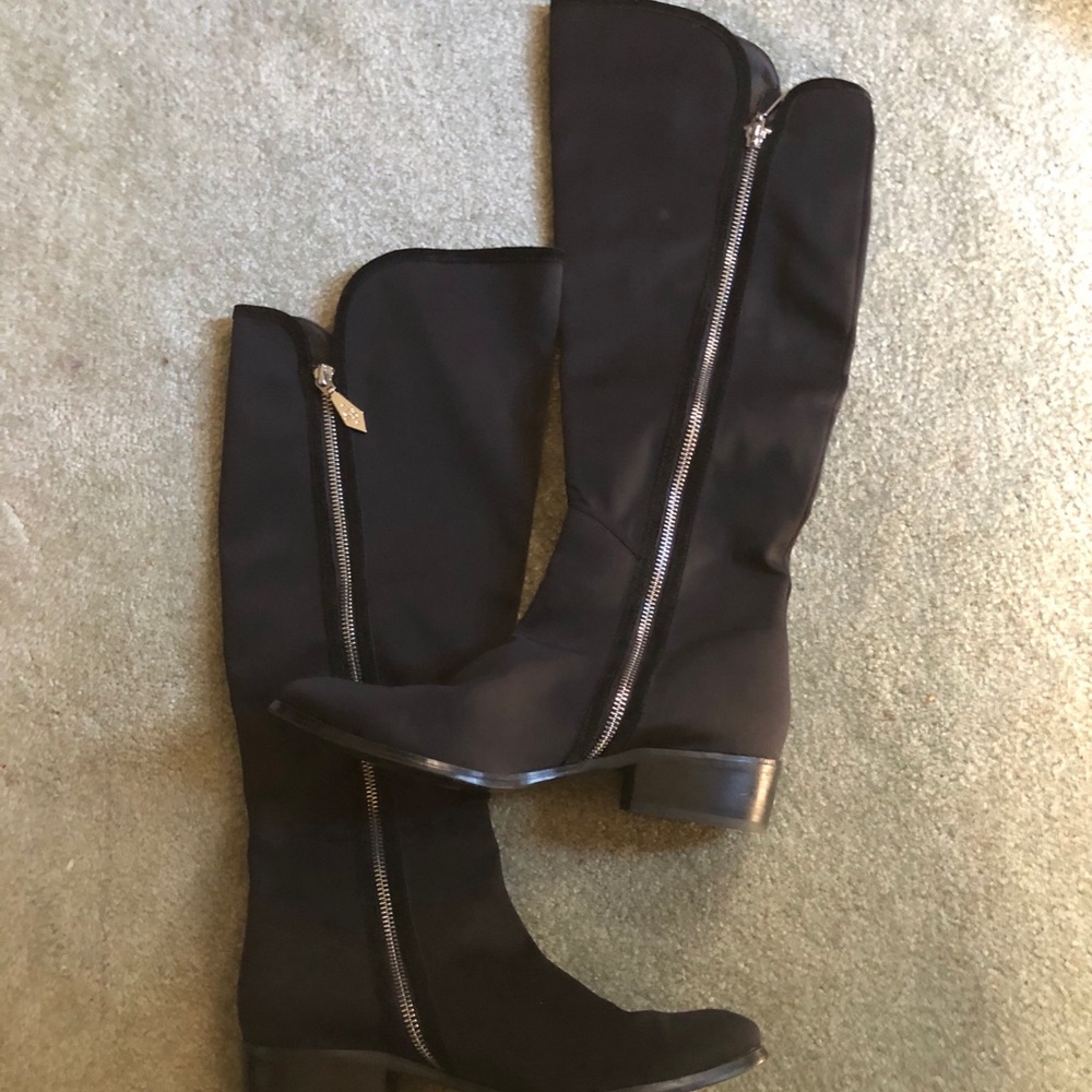Black cloth boots with zipper. Worn a few times.